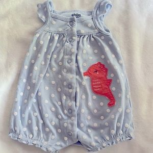 Gently used seahorse button down onesie. Brand:child of mine. Size:0-3 months